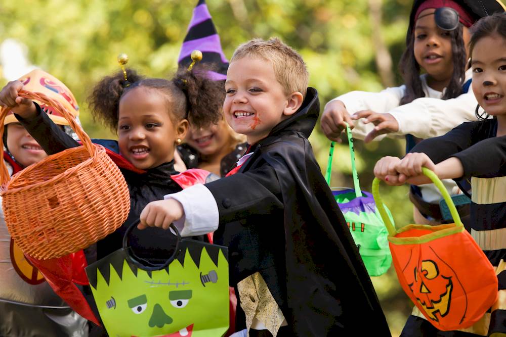 Image of kids in Halloween Costumes