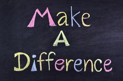 word "make a difference" handwritten on blackboard