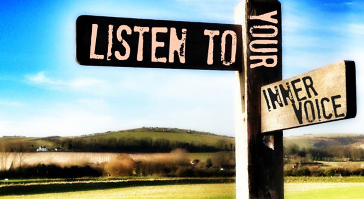 Road sign reading "Listen to your inner voice"