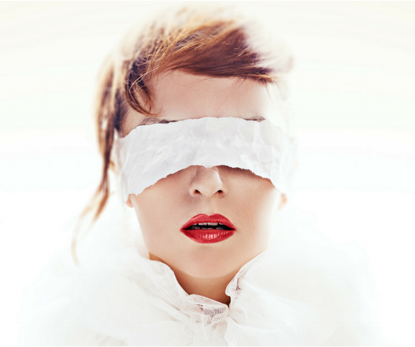 Image of a blindfolded woman