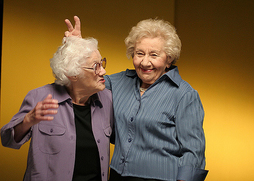 Image of two old women laughing