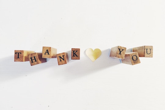 "Thank You" spelled out in wooden blocks