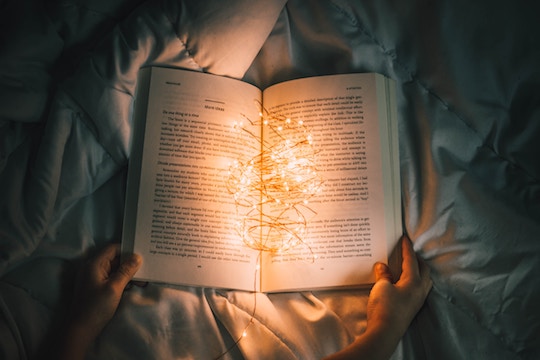 Image of a book filled with lights