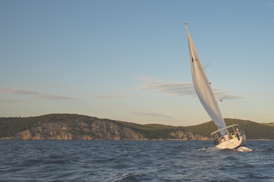 Image of a sailboat on rough waters