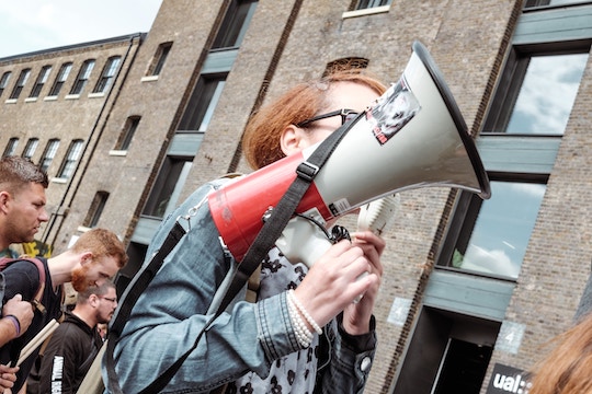 Image of a person holding a megaphone