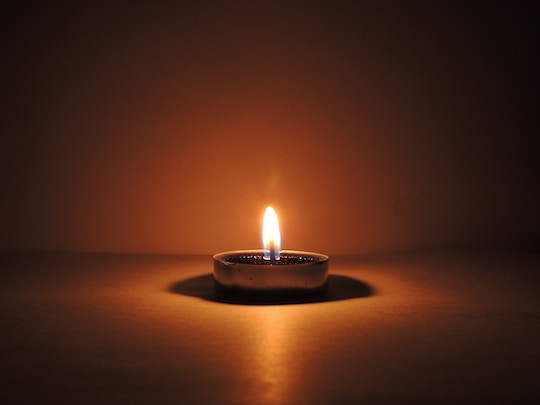 Image of a small candle burning