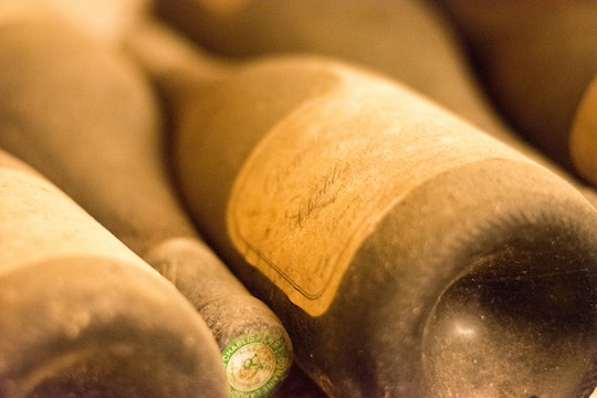 Image of dusty wine bottles