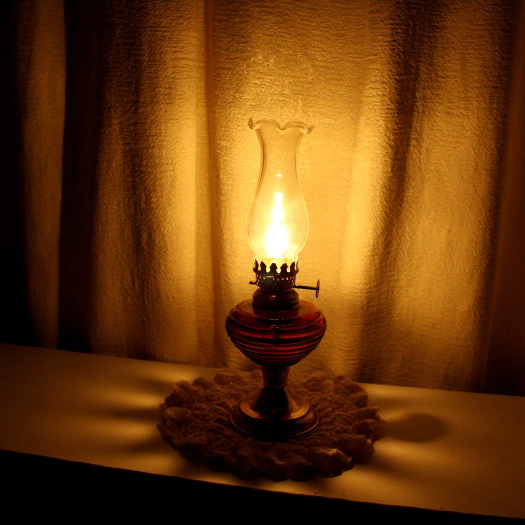 Image of an oil lamp on a table