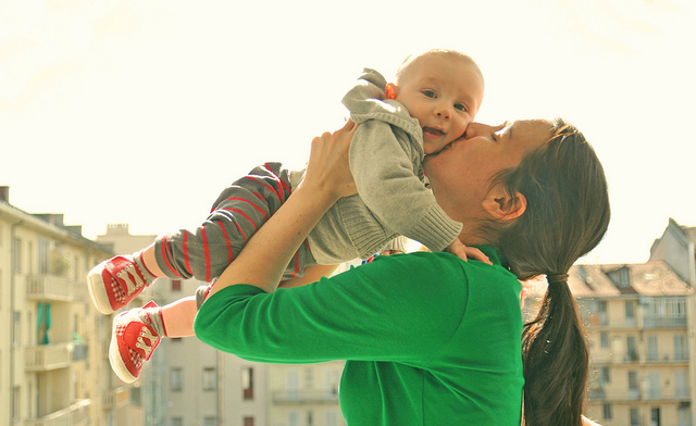 Image of a mother holding a baby