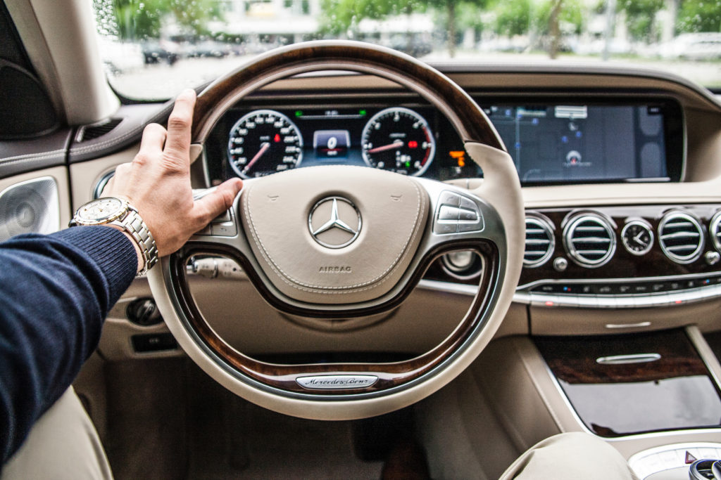 Image of hands on the steering wheen