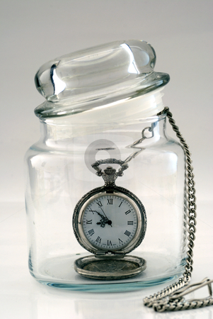 Image of a watch in a glass bottle