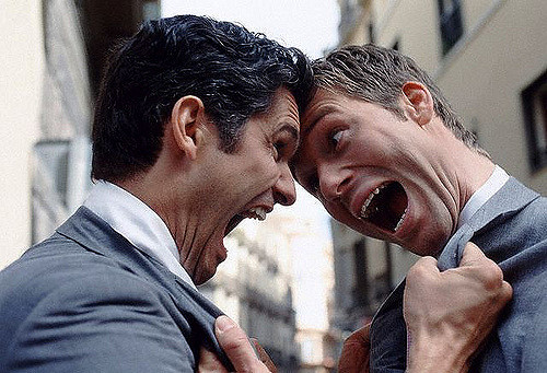 Image of 2 men screaming at each other