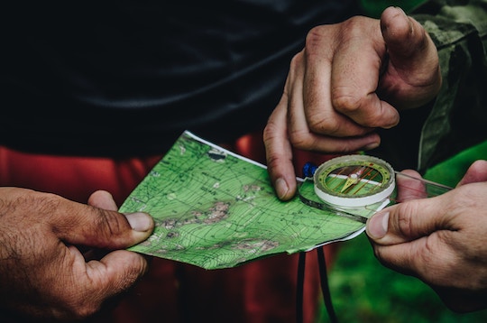 Image of hands holding a map