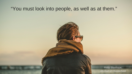 Image of a man on the beach staring into space