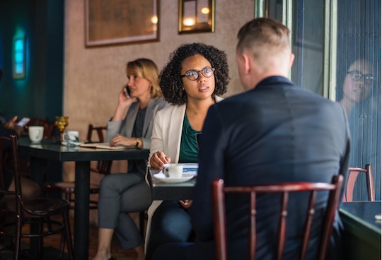 Image of a man and woman in a coffee shop