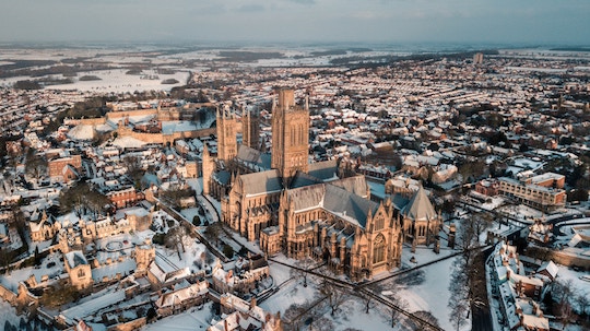 Image of a large church towering over a city