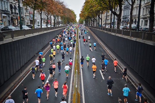 Image of people running on the street